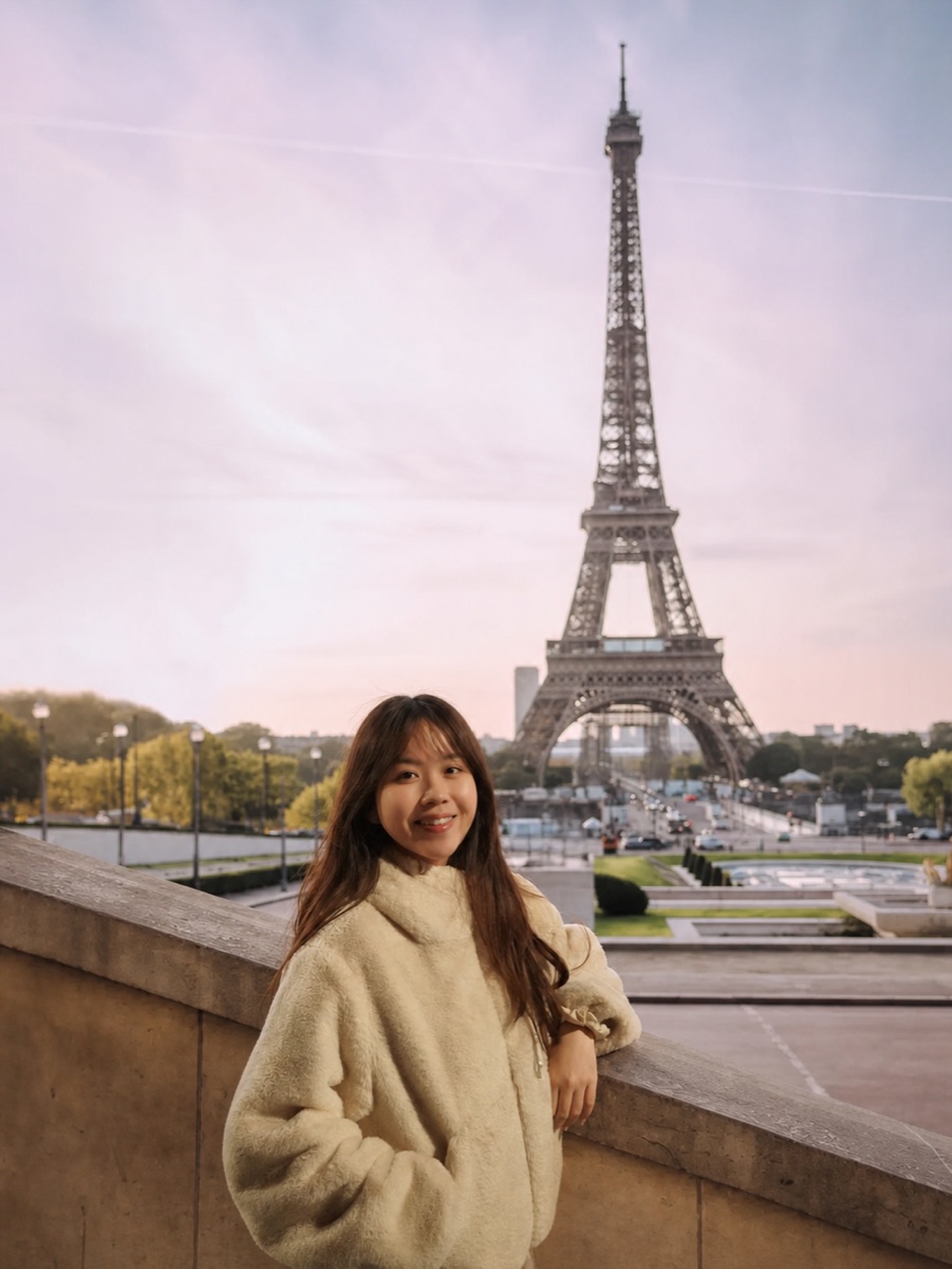 Emily Tran at the Trocadéro with the Eiffel Tower in the background, Paris