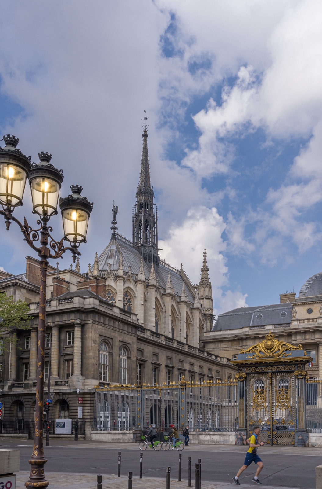 Exterior of Sainte-Chapelle with its Gothic spire rising above the Palais de Justice, Paris